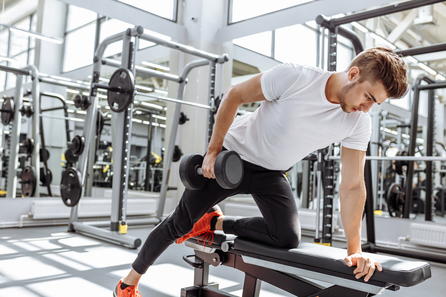 What Are Reps - man doing reps in gym